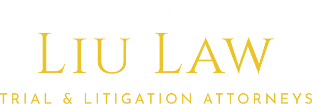 A green and yellow logo for the law firm of aula.